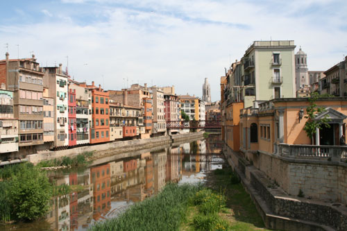 Here a picture of the skyline of Girona and the river "Onyar"