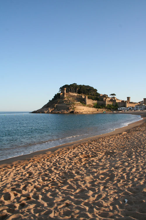 The beach and city wall of Tossa